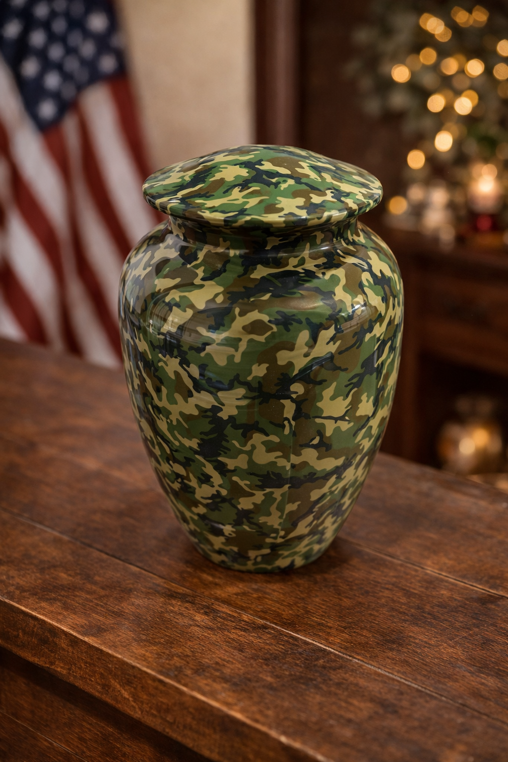 Durable camouflage aluminum cremation urn with a secure lid and glossy finish