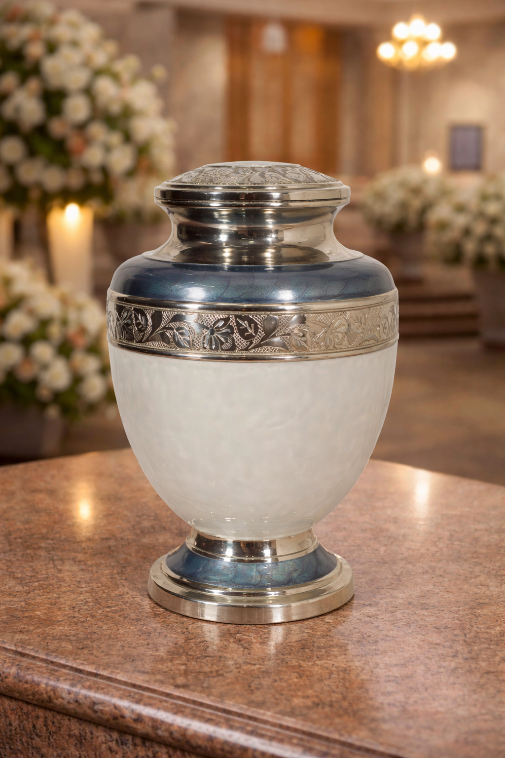 Elegant dual-tone aluminum cremation urn with white body, blue accents, and engraved silver bands