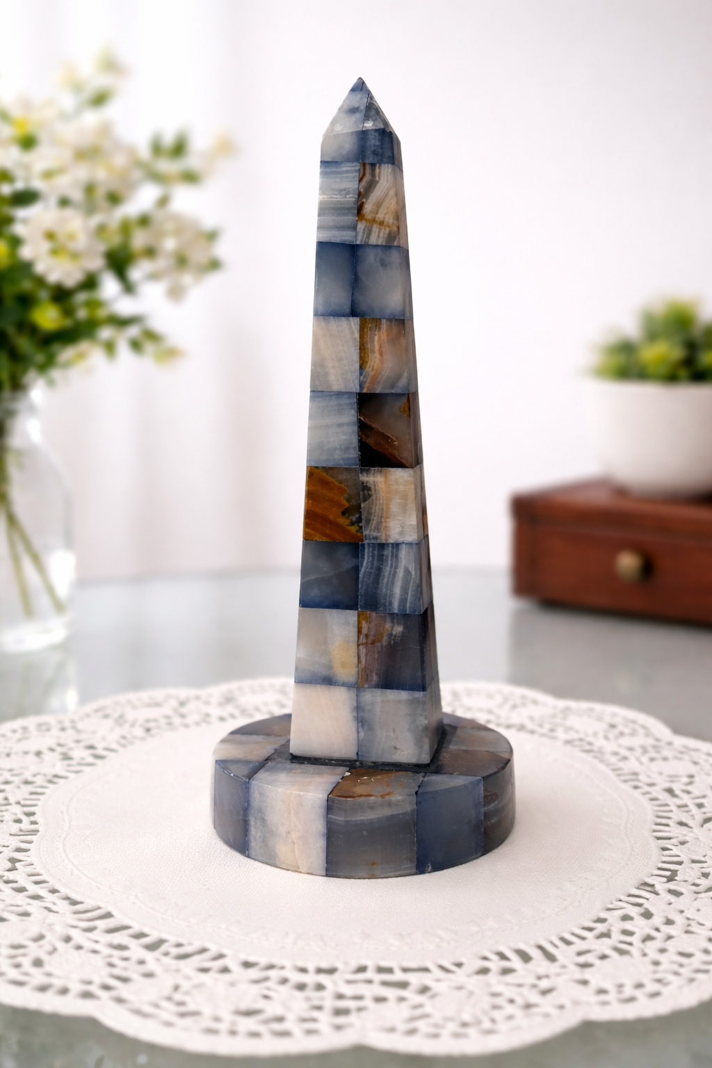 Multicolor marble Washington Monument obelisk sculpture with mosaic stone design and polished finish