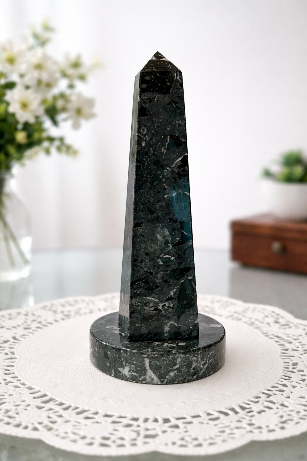 Dark green marble Washington Monument obelisk sculpture with polished natural stone finish