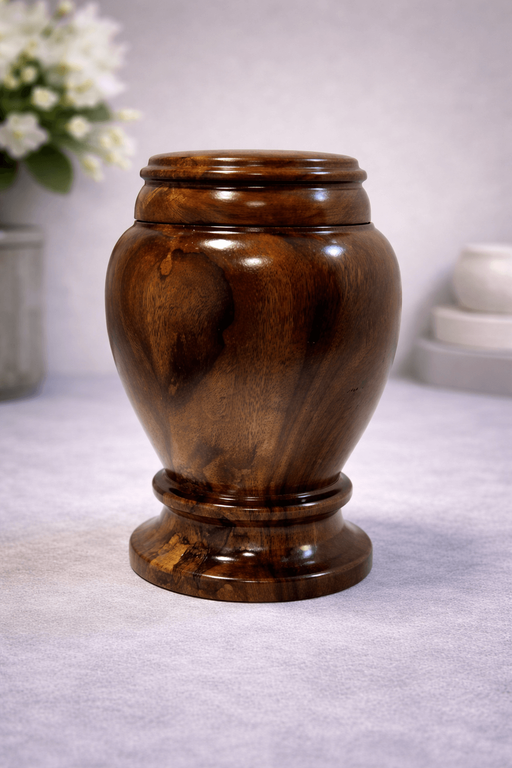Premium handcrafted wooden urn with rich natural grain and polished finish