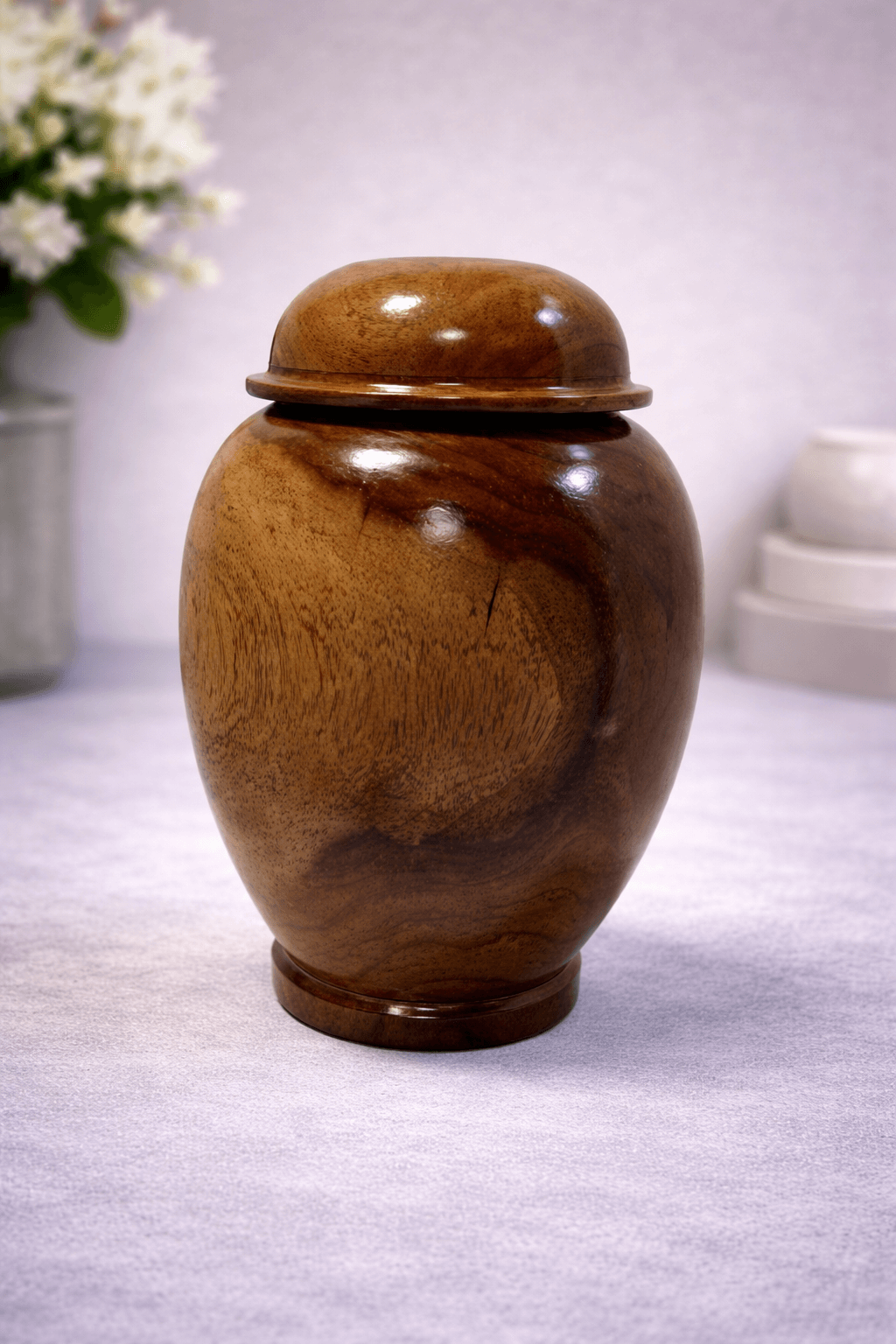 Elegant solid wood urn with natural grain and smooth polished finish